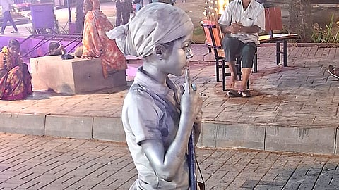 A child dressed as Mahatma Gandhi at the Dasara Exhibition Grounds