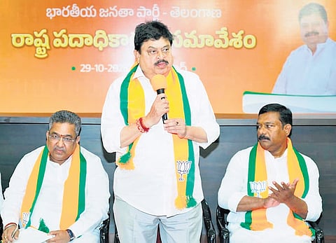 BJP state president N Ramchander Rao addresses a meeting of the party’s state office bearers in Hyderabad on Wednesday.