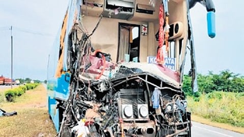 The mangled passenger bus.