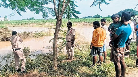 DRF and police teams search for one person who was washed away in floods near Thimmampet village in Zaffergadh mandal, Jangaon district.