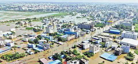 An aerial view of the flooded Hunter Road near Bhadrakali lake in Hanamkonda.
