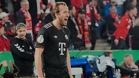 Bayern's Harry Kane celebrates after scoring his side's second goal during the German soccer cup match between Cologne and FC Bayern Munich in Cologne, Wednesday, Oct. 29, 2025.