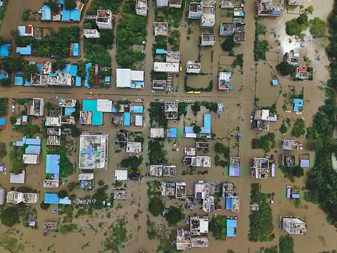 An aerial view of the flooded Hunter Road near Bhadrakali Lake in Hanamkonda.