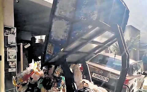 A GBA auto tipper dumps garbage in front of a house. Similar action was taken in 218 wards under the five city corporations on Thursday.