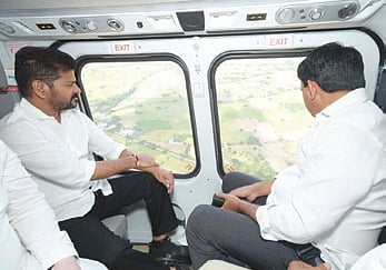 Chief Minister A Revanth Reddy conducts an aerial survey of flood-affected areas.