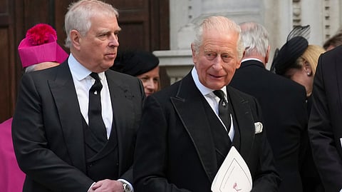 Britain's Prince Andrew, left, and Britain's King Charles III.