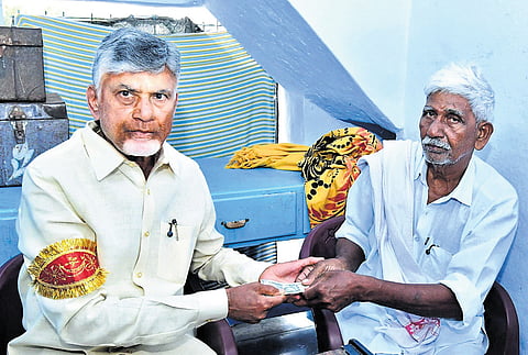 CM N Chandrababu Naidu hands over NTR Bharosa pension to a beneficiary during a programme held at Peddannavaripalli in Sri Satya Sai district on Saturday
