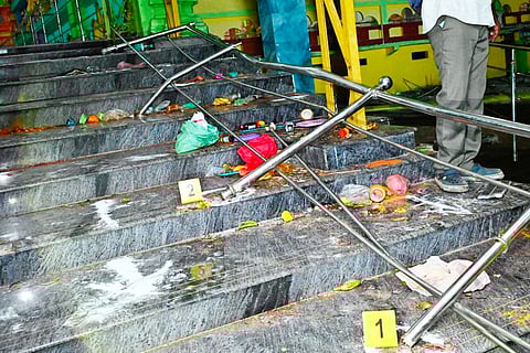 Puja' items lie at the Venkateswara temple after a stampede, at Kasibugga in Srikakulam district, Saturday, Nov. 1, 2025. At least nine people were killed and several others suffered injuries in the incident.