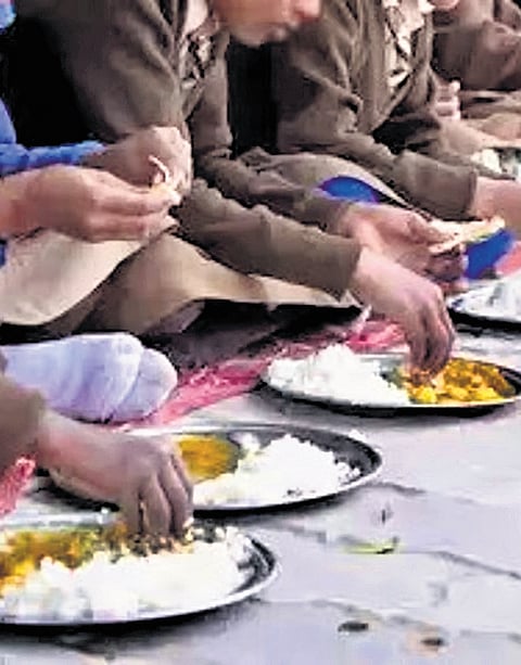Some students said that the cauliflower and cabbage curry served for dinner caused the symptoms.