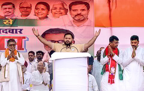 RJD leader Tejashwi Yadav addressing a poll rally in Bihar.