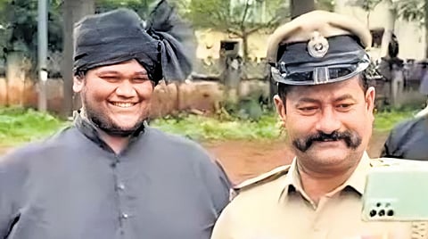 Police Inspector JM Kalimirchi’s selfie with MES leader Shubham Shelke.
