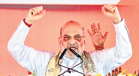 Union Home Minister Amit Shah addresses a rally in Muzaffarpur on Sunday.