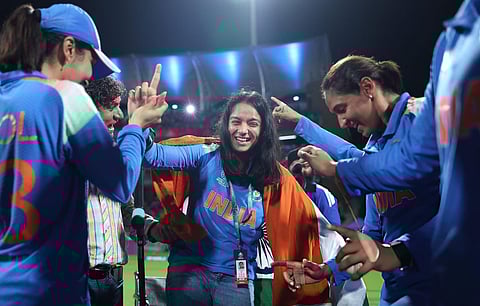 Pratika Rawal celebrating with her teammates Harmanpreet Kaur and batter Jemimah Rodrigues.