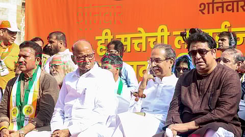 In this photo from Nov 01, 2025, MNS Chief Raj Thackeray (R), Shiv Sena (UBT) Chief Uddhav Thackeray (C) and NCP (SP) Chief Sharad Pawar (2-L) protest against the Election Commission's inaction on electoral roll registration in Mumbai.