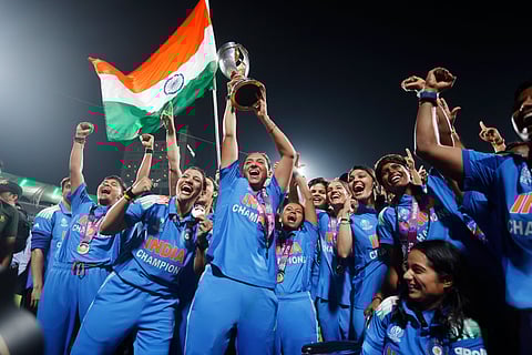 India's players celebrate with the trophy after their win over South Africa in the ICC Women's Cricket World Cup final match in Navi Mumbai, India, Monday, Nov. 3, 2025.