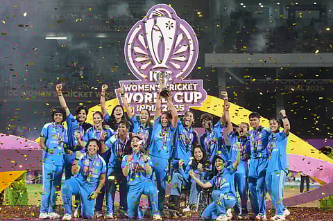 India team with the ICC Women's World Cup trophy after beating South Africa in the final on Sunday