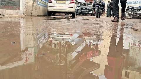 Water overflows on a road in Rahmatnagar under the Jubilee Hills constituency on Monday | SRI LOGANATHAN VELMURUGAN