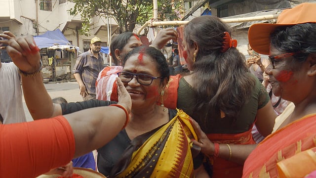 A scene from 'Working Girls' where sex workers engage in 'Sindoor Khela' during durga puja