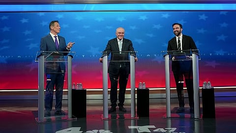 From left, mayoral candidates, Independent candidate Andrew Cuomo, Republican candidate Curtis Sliwa, and Democratic candidate Zohran Mamdani participate in a debate.