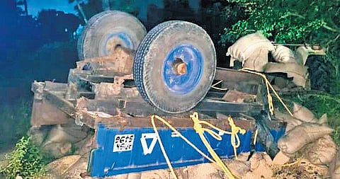 A tractor that overturned after colliding with a bus in Karimnagar on Tuesday.