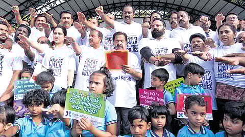 Ramesh Chennithala reads out the anti-drug pledge in Kochi on Tuesday. Actors Mia and Tini Tom, MLA Anwar Sadath and former Kochi mayor Soumini Jain are also seen