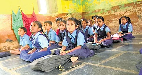 A class in progress at the building that also houses a GP office in Gadag district.