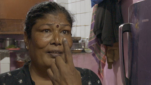 A scene from 'Working Girls', where a 'madam' of a brothel shows the electoral ink on her finger
