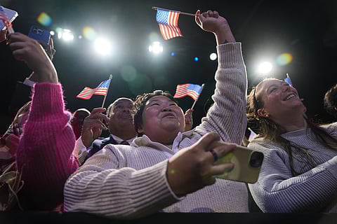 People cheer as Democrat Abigail Spanberger walks out on stage after she was declared the winner of the Virginia governor's race during an election night watch party Tuesday, Nov. 4, 2025, in Richmond, Va.