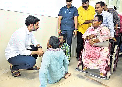 Minister for IT Nara Lokesh takes representations from the public during Praja Darbar at the TDP Central Office in Mangalagiri on Tuesday.