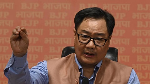 Union Minister of Parliamentary Affairs Kiren Rijiju addresses a press conference at the BJP headquarters, in New Delhi.