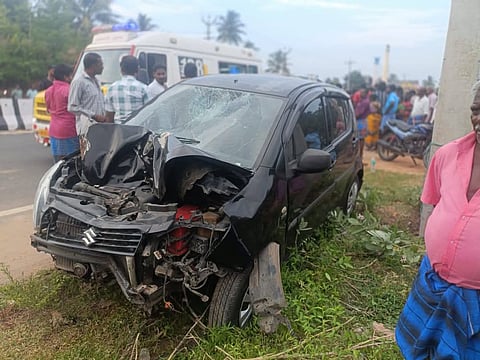 The damaged car that killed two labourers.