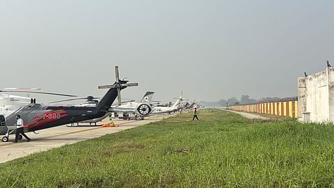 Helicopters lined up on the runway of the Jayprakash Narayan International Airport in Patna.