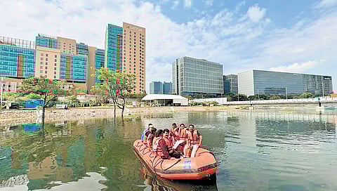 Citizens enjoy a boat ride at the rejuvenated Ranglalkunta in Financial District