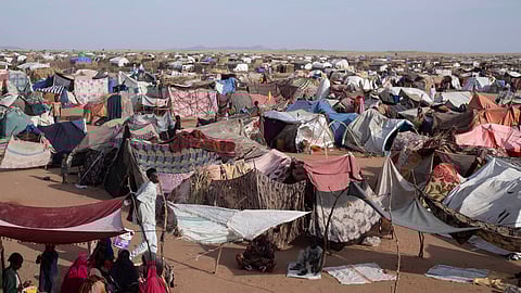 Makeshift shelters erected by displaced Sudanese who fled El-Fasher after the city fell to the Rapid Support Forces (RSF), make up the Um Yanqur camp, located on the southwestern edge of Tawila, in war-torn Sudan's western Darfur region on November 3, 2025.