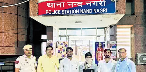 Police with the accused arrested for stealing a Kalash from Jain temple.