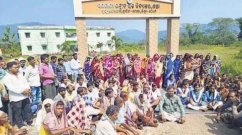 Villagers staging dharna in front of the government upgraded high school at Usta.
