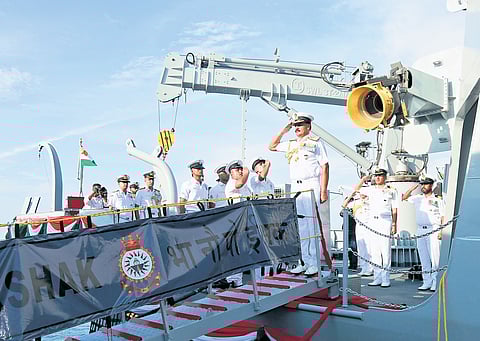 Chief of Naval Staff Admiral Dinesh Tripathi saluting the flag during the commissioning of survey vessel INS Ikshak at Kochi Naval Base on Thursday