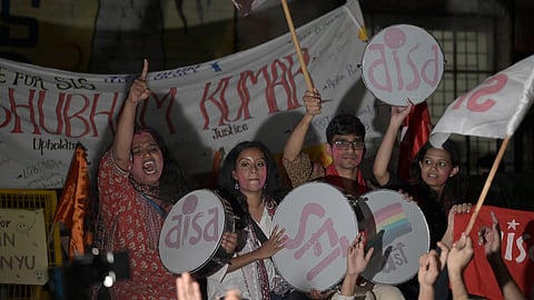 Winning candidates in the JNUSU polls Aditi Mishra ( President, SFI) K Gopika ( VP, SFI) Sunil Yadav ( Gen Sec, DSF) and Danish Ali ( Joint Secretary, AISA) celebrate after the results on campus in New Delhi on Thursday.