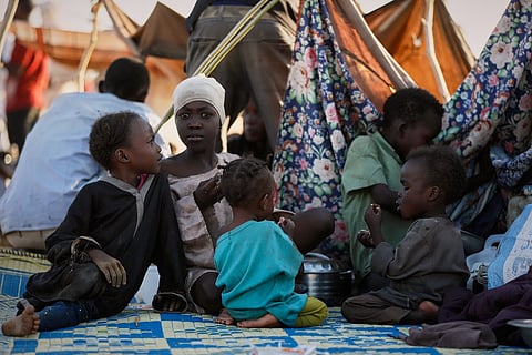This photo released by UNICEF shows displaced children and families from el-Fasher at a displacement camp where they sought refuge from fighting between government forces and the RSF, in Tawila, Darfur region, Sudan, Monday, Oct. 27, 2025.