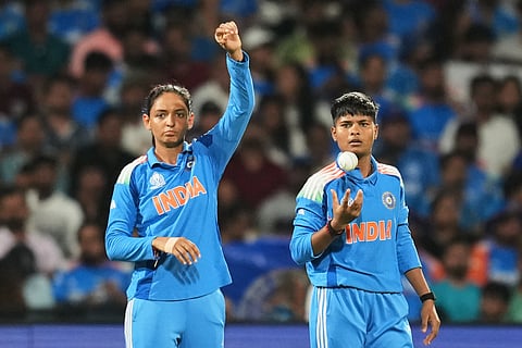 Kranti Goud (right) with skipper Harmanpreet Kaur during the ICC Women's Cricket World Cup final between India and South Africa (Photo | AP)