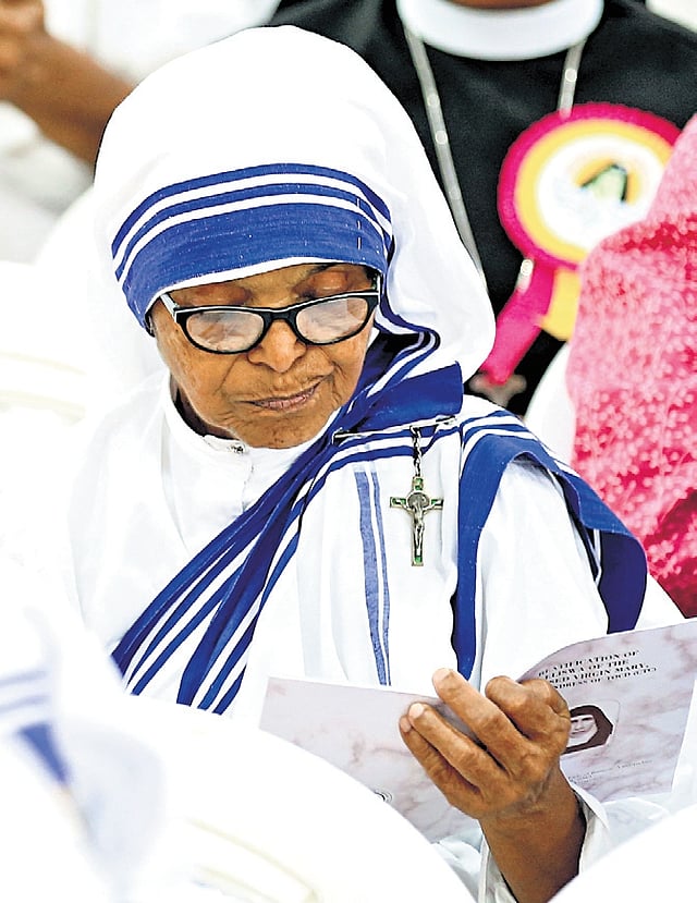 A nun from the Missionaries of Charity congregation participates in the holy mass