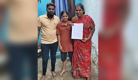 Sangavi (C) received the certificate with an incorrect gender