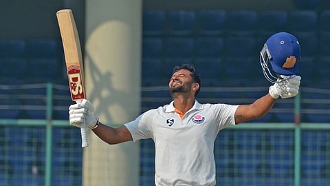 In another match, captain Paras Dogra scored 106 off 183 to help Jammu and Kashmir secure first innings lead against hosts Delhi on Sunday