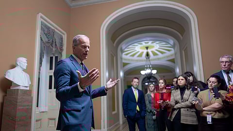 US Senate Majority Leader John Thune, R-S.D., speaks to reporters after final Senate passage of the stopgap funding bill to reopen the government through Jan. 30, at the Capitol in Washington, Monday evening, Nov. 10, 2025.