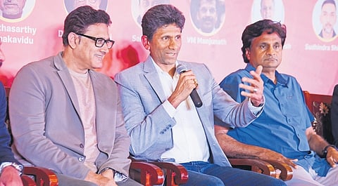 Former India cricketer Venkatesh Prasad addresses media in Bengaluru on Tuesday. Cricketing legends Anil Kumble and Javagal Srinath look on