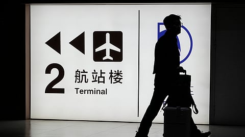 A passenger arrives at the Capital Airport in Beijing on Nov. 7, 2025.