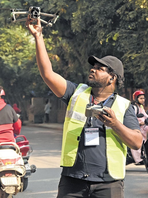 A drone operator uses his device to record the proceedings in Borabanda on Tuesday | SRI LOGANATHAN VELMURUGAN