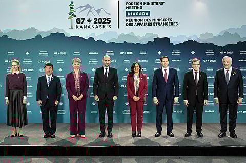 Foreign Ministers, from left, European Union's Kaja Kallas, Japan's Toshimitsu Motegi, Britain's Yvette Cooper, France's Jean-Noel Barrot, Canada's Anita Anand, U.S. Secretary of State Marco Rubio, Germany's Johann Wadephul and Italy's Antonio Tajani pose for the family photo during the G7 Foreign Ministers' meeting at the White Oaks Resort in Niagara-on-the-Lake, Ontario, Canada, Tuesday, Nov. 11, 2025
