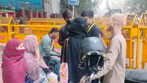 Families waited anxiously outside LNJP Hospital for a word on their loved ones