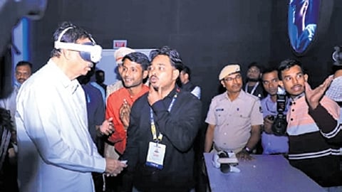 Guv tries a VR headset at the Cuttack-in- Cuttack pavilion.
